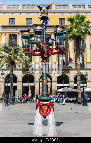 Street lamp designed by Antoni Gaudi in Plaza Real or Placa Reial, Barcelona, Catalonia, Spain Stock Photo
