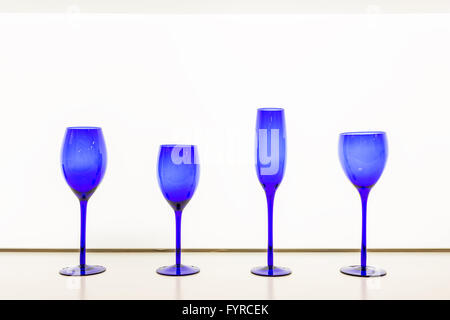 isolated empty blue goblet against white background Stock Photo
