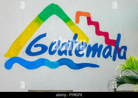 The Guatemalan Tourism Logo Sign Painted On The Wall Of The Cruise Ship Welcome Centre In Santo Tomas de Castilla Guatemala Stock Photo