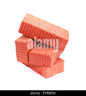 Stack of few red bricks on white background Stock Photo