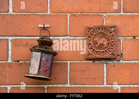 Stat Fortuna Domus Terracotta wall plaque. Glastonbury, Somerset, England Stock Photo