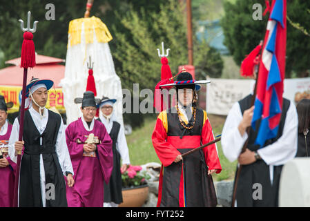 Gyeonggi-do, South Korea - April 22, 2016: Gyeonggi-do, South Korea April 22, 2016 Guards protect the village dressed in traditi Stock Photo