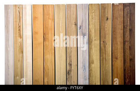 Colorful background texture and pattern of different wood varieties and colors in upright parallel planks in a full frame view Stock Photo