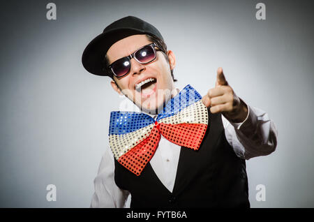 Funny man with giant bow tie Stock Photo