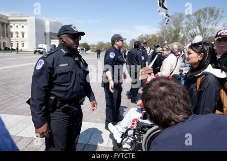 US Capitol Police holding line protesters during public demonstration - Washington, DC USA Stock Photo