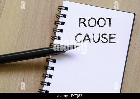 Root cause write on notebook Stock Photo