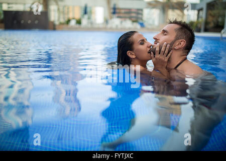 Couple in the pool Stock Photo