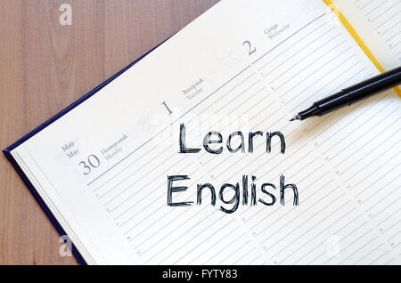Learn english write on notebook Stock Photo