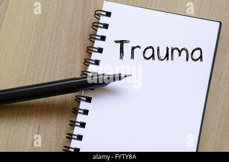 Trauma write on notebook Stock Photo