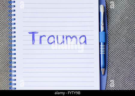 Trauma write on notebook Stock Photo