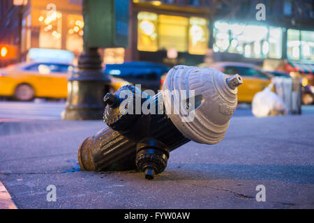 A damaged fire hydrant on Madison Avenue in New York on Thursday, April 21, 2016.  (© Richard B. Levine) Stock Photo