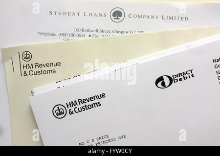 Letters and envelopes from HM Revenue & Customs and Student Loans Company against a white background. Stock Photo