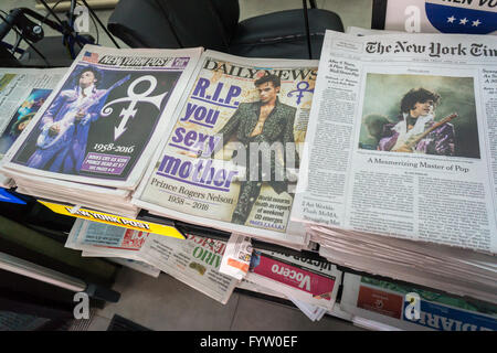 Front pages and headlines of the New York newspapers on Friday, April 22, 2016 report on the previous day's death of popular musician Prince. Prince, whose full name was Prince Rogers Nelson, was found unresponsive in his Chanhasen MN, a suburb of Minneapolis,  home (© Richard B. Levine) Stock Photo