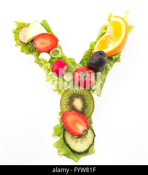 Letter Y made of salad and fruits. Stock Photo