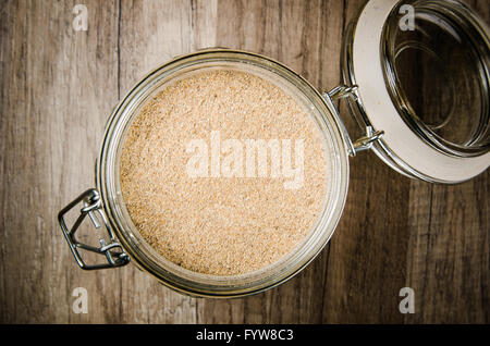 Wholemeal flour in a glass jar Stock Photo