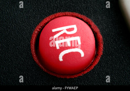 Red record button on remote control Stock Photo