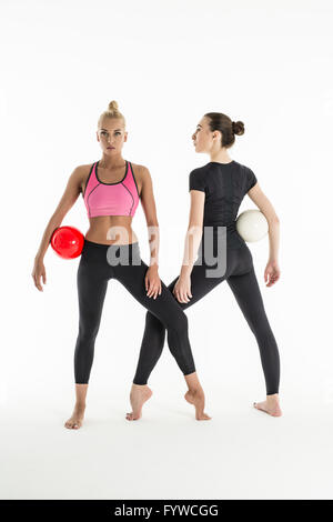 Two girls with balls Stock Photo