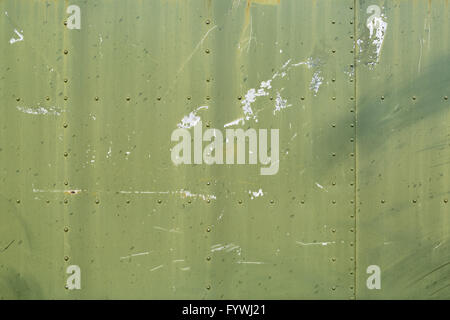 Military green metal plates background texture with seams and rivets ...