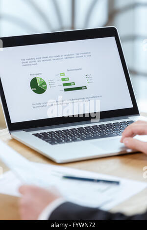 businessman checking financial reports Stock Photo