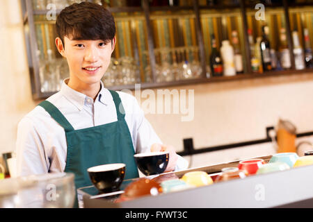portrait waitress and waiter in cafe Stock Photo
