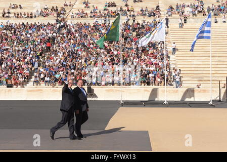 Athens, Greece. 27th Apr, 2016. Common entrance of the President of the Organising Committee 'Rio 2016' Mr. Carlos Nuzman (left) and of the President of the Hellenic Olympic Committee Mr. Spyros Capralos (right). © Dimitrios Karvountzis/Pacific Press/Alamy Live News