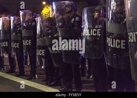 Costa Mesa, California, USA. 28th Apr, 2016. Police officers stand by while anti-Trump protestors demonstrate following the conclusion of a rally for 2016 Republican presidential candidate Donald Trump. Trump made a trip to speak to voters in Southern California ahead of the primary contest on June 7th. Credit:  Mariel Calloway/ZUMA Wire/Alamy Live News Stock Photo