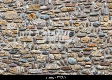 Wall of pebbles Stock Photo
