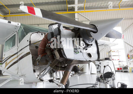 Repairing small propeller airplane Stock Photo