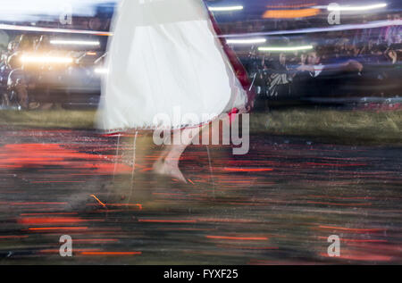 Nestinar woman walking on fire Stock Photo