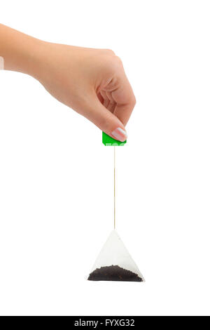 Hand and tea bag Stock Photo