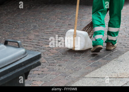 Municipal Dustman Worker with Cleaning Tools Stock Photo