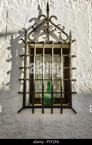 Grilled window in Altea. Alicante. Valencia community. Spain Stock Photo