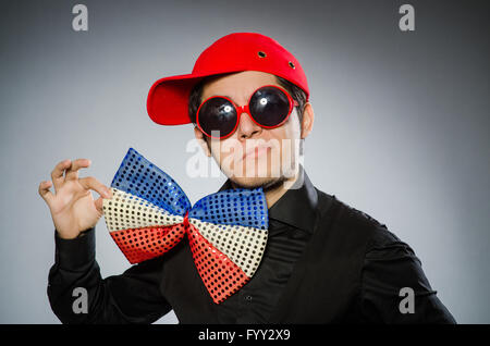 Funny man with giant bow tie Stock Photo