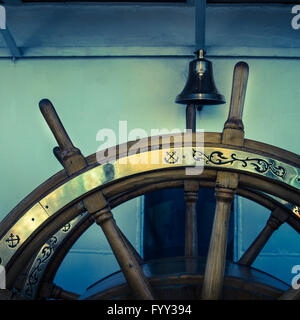 Steering wheel of an old sailing vessel, close up Stock Photo