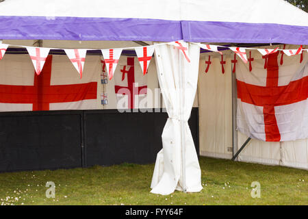 England flags and bunting on display at St Georges Day Festival in Poole, Dorset, UK Stock Photo