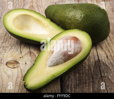 Avocado on Wood Stock Photo