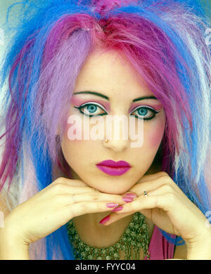 Punk girl with multi-coloured pastel hair, inside. Stock Photo