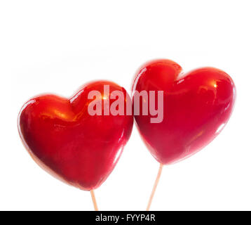 Two red hearts isolated on white Stock Photo