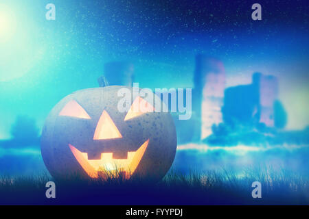 Halloween pumpkin glowing in dark Stock Photo