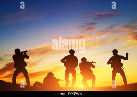 Soldiers in assault. War, army, military. Stock Photo