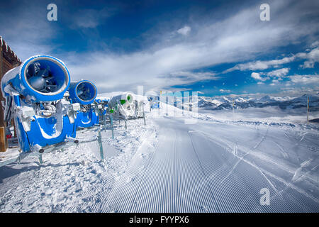 Snow cannon gun or machine sprays water and snowes a ski or cross-country  track 27596714 Stock Photo at Vecteezy