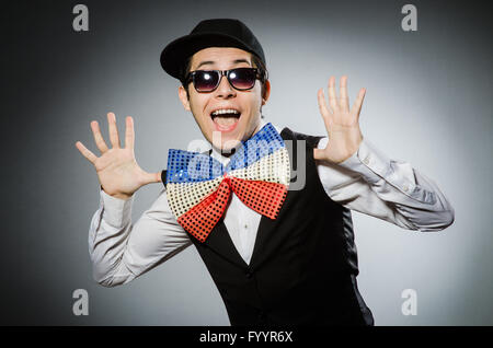 Funny man with giant bow tie Stock Photo