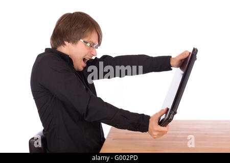 Business man tries to destroy his laptop Stock Photo