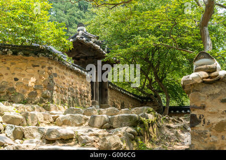 Traditional Korean temple door and steps Stock Photo