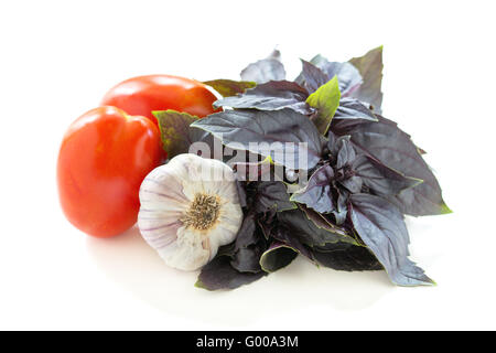 Purple basil, tomatoes and garlic . Stock Photo