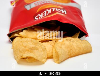 An open packet of walkers crisps Stock Photo