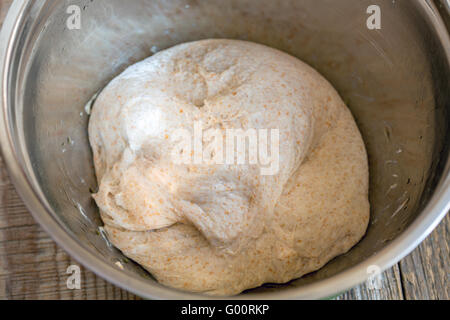 Mixing Bread Dough In A Metal Bowl With A Wooden Spoon High-Res Stock Photo  - Getty Images