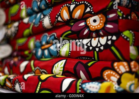 Multi colored flower pattern on patio chair cushions Stock Photo