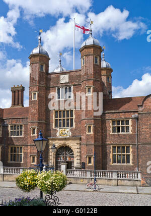 Abbot's Hospital a Jacobean alms house flying the cross of St. George in High Street  Guildford, Surrey, England Stock Photo