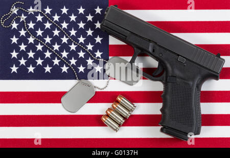 Close up of military equipment on USA Flag Stock Photo